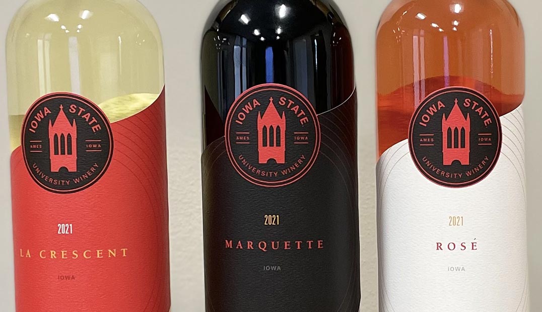 Closeup of labels on three varieties of ISU wine: La Crescent, Marquette and Rose