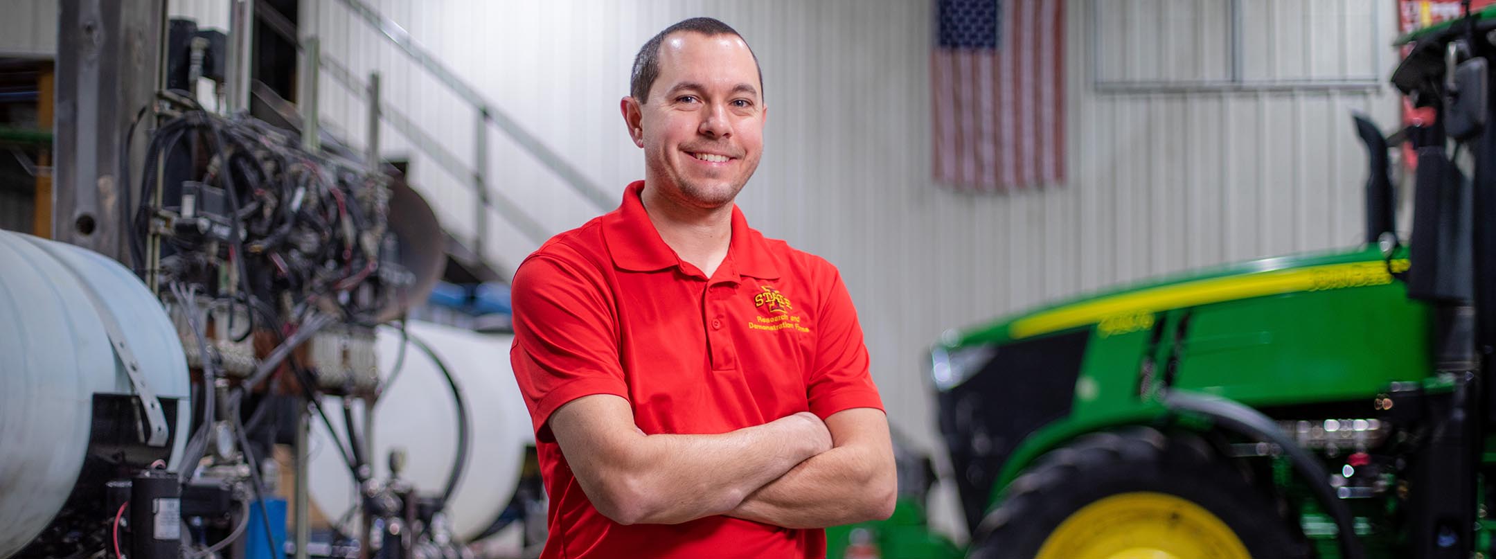 Informal portrait of Nathan Meyers in the farm equipment shop.