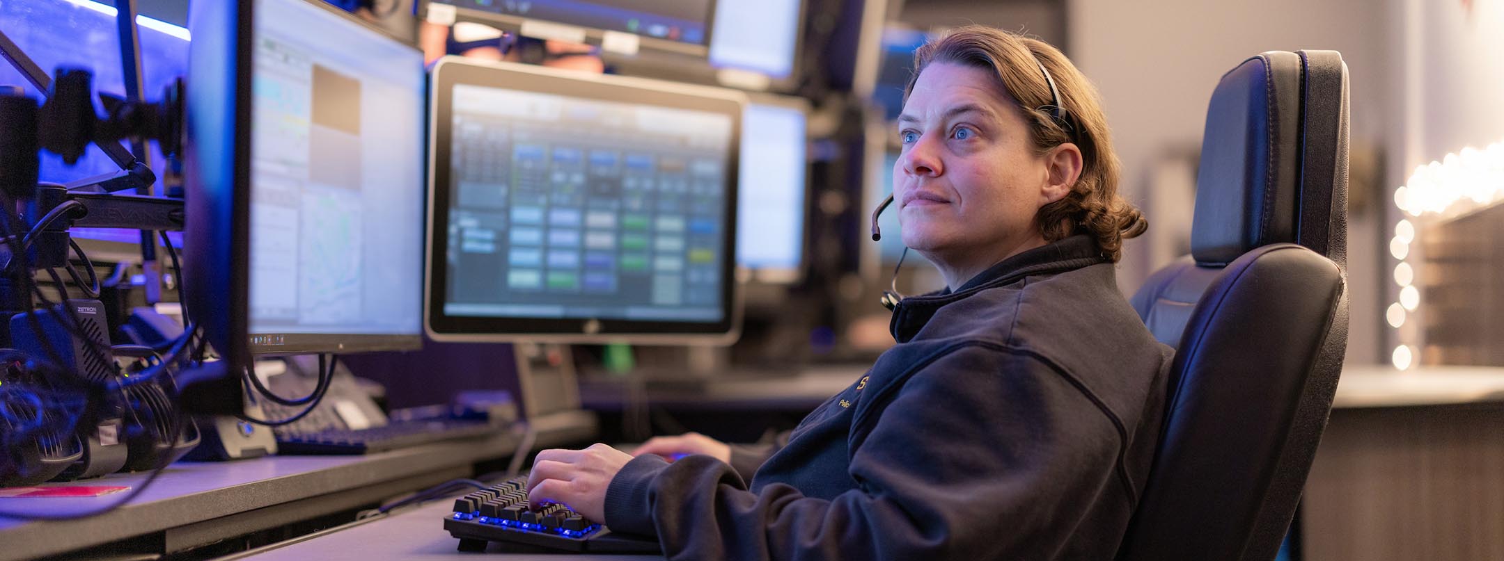 Informal portrait of Tammy Barker at her dispatch desk.